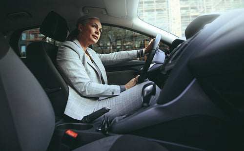 Mature woman driving a car