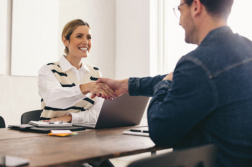 Excited HR manager hiring a new employee