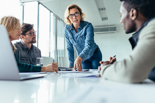 Businesswoman leading business presentation