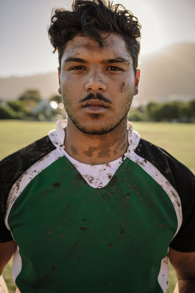 Muddy rugby player