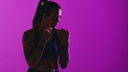 Fit woman working out with focus