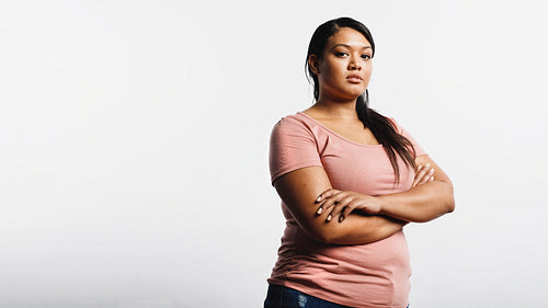 Woman standing with arms crossed