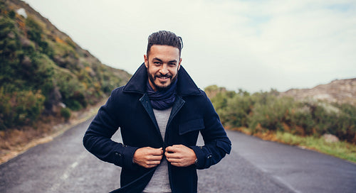 Handsome man on countryside highway
