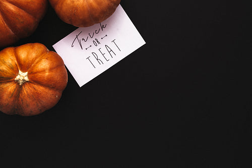 Pumpkins and trick or treat card