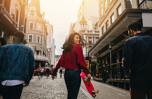 Young people enjoying together on the street