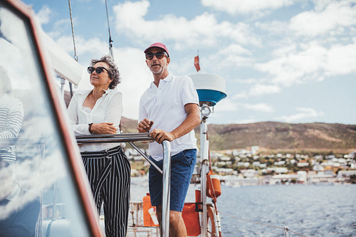 Mature couple having vacation on a yacht