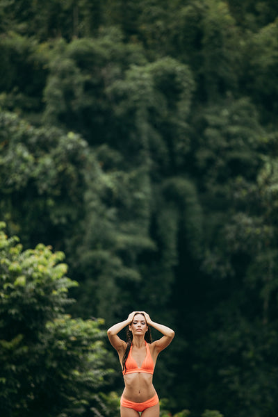 Beautiful young woman posing in bikini