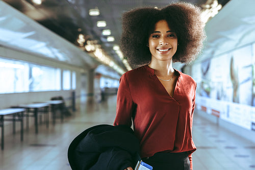Woman traveler at airport boarding gate