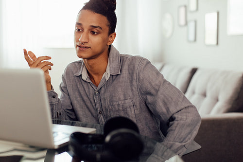 Man having a virtual meeting at home