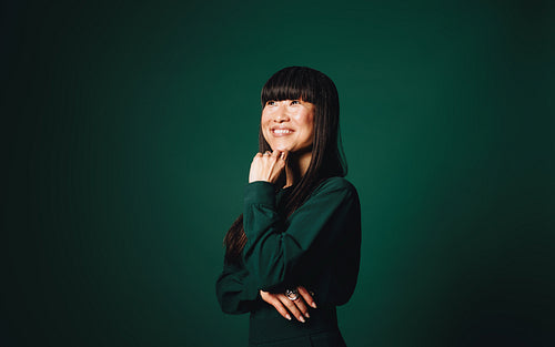 Confident professional Korean woman portrait in studio