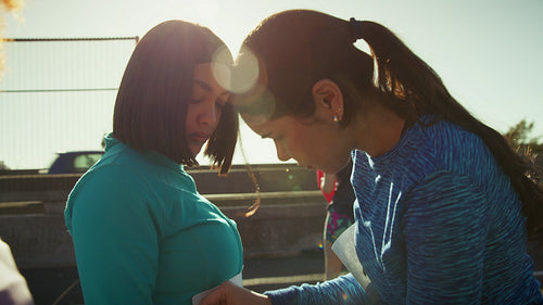 Women preparing for a running race