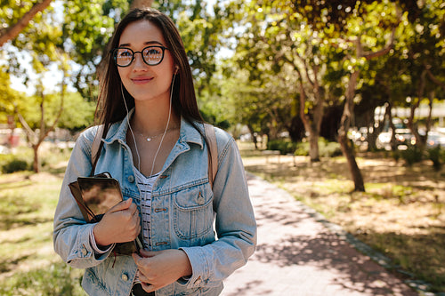 Close up of a college girl standing outdoors