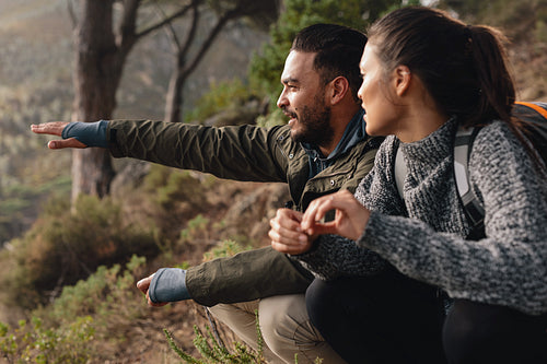 Young couple hiking on mountains