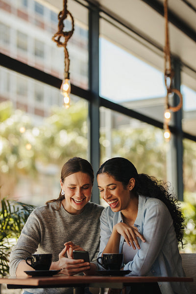 Friends sitting in a cafe