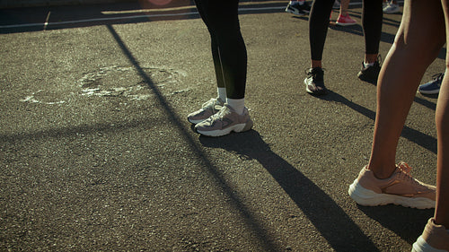 Runners stretching for a race outdoors