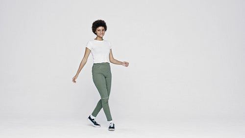 Cheerful woman showing some dance moves