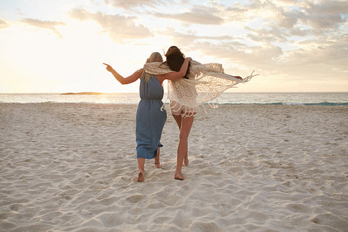 Woman friends enjoying a day on the beach