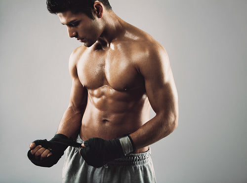Young boxer preparing for fight