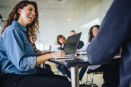 Female professional smiling during meeting