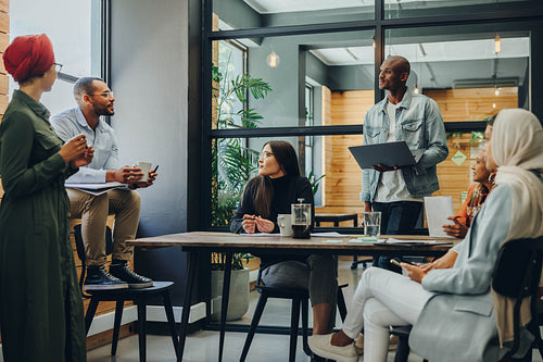 Multicultural business professionals having a meeting in an offi