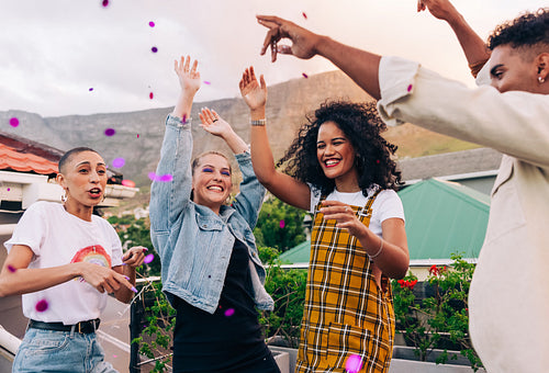 Dancing  under purple confetti