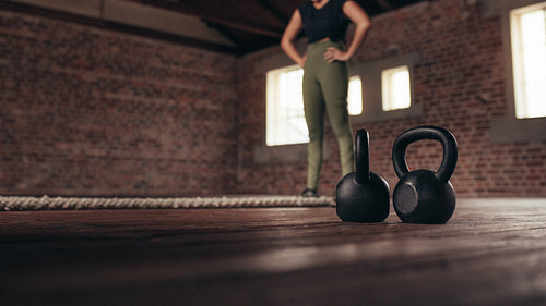 Woman exercising at cross training gym