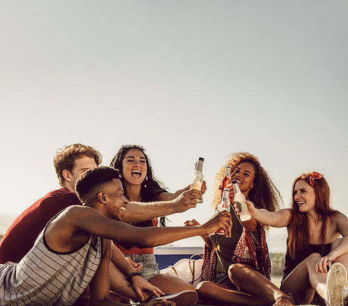 Partying outdoors with beers