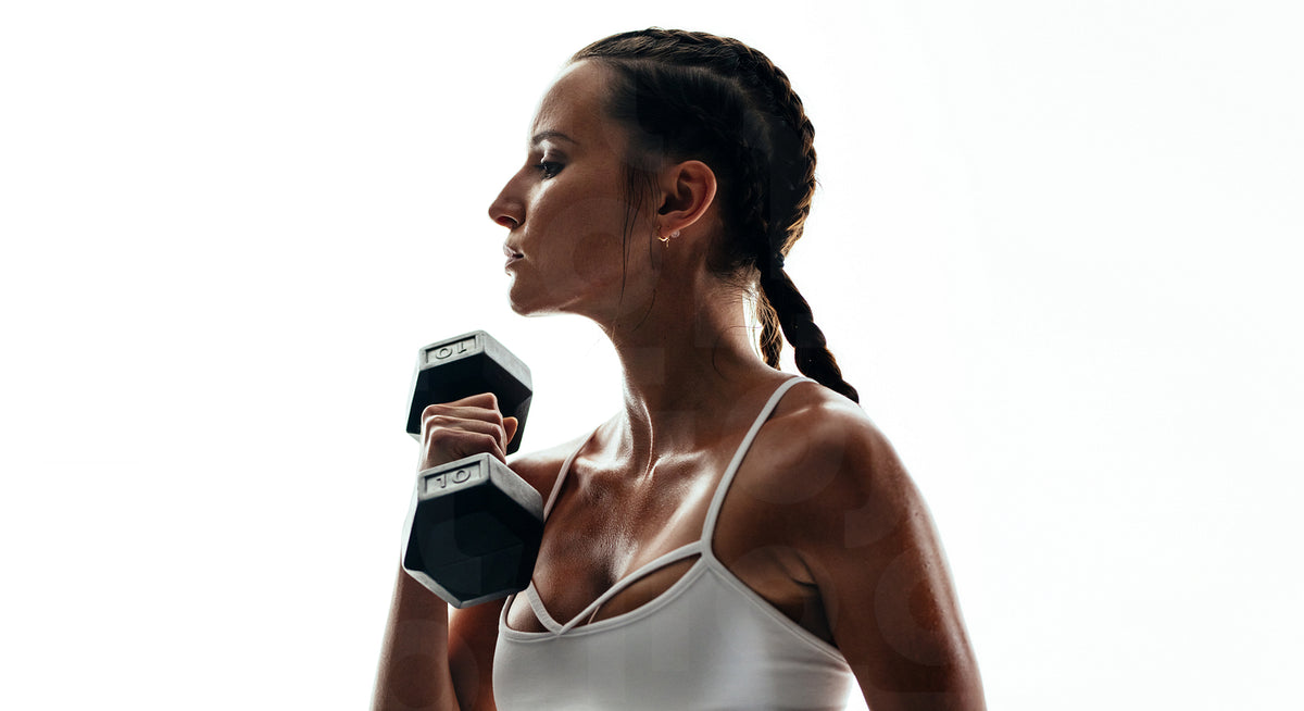 Fitness model exercising with dumbbell – Jacob Lund Photography Store ...