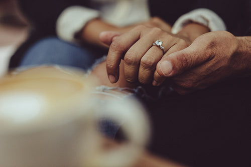 Close-up of loving couple at coffee shop