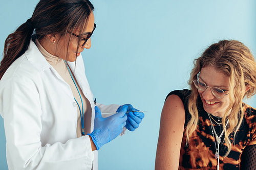 Woman getting vaccinated