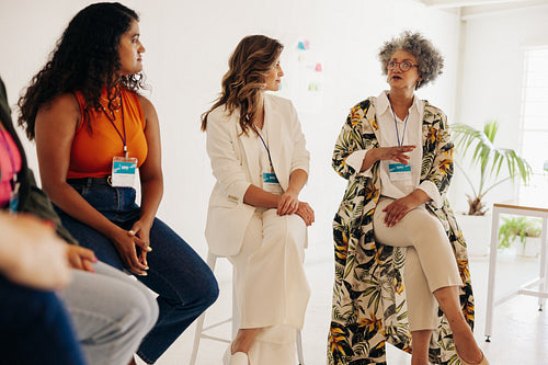 Diverse businesswomen having a discussion during a conference me
