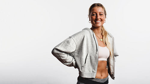 Fitness woman standing in workout clothes