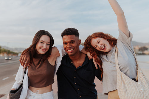 Diverse friends having a good time together in the waterfront