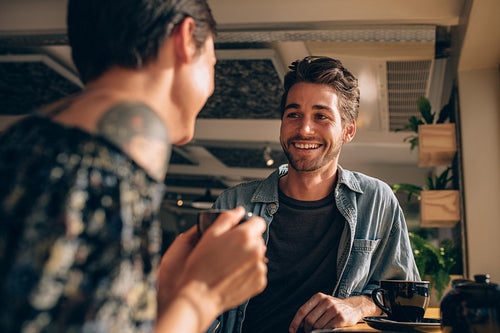 Young couple meeting at a cafe