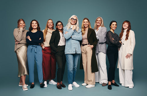 Women smiling cheerfully in a studio