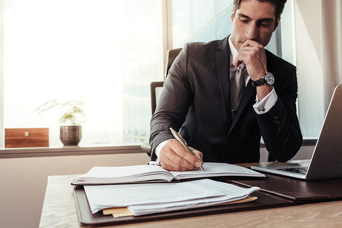 Male entrepreneur working at his desk