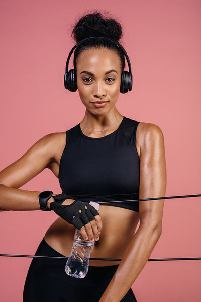 Healthy woman taking a break after training