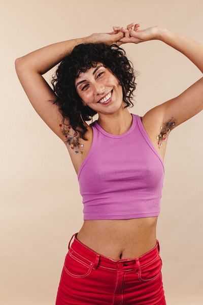 Body positive young woman flaunting her confetti-decorated under
