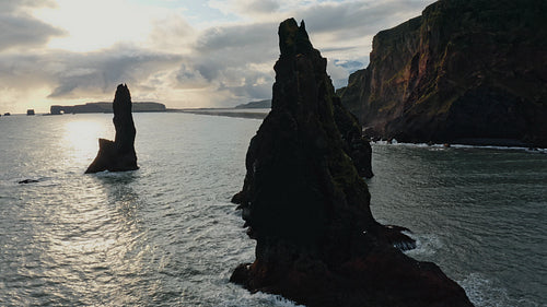 Reynisfjara black sand beach with troll toes rock