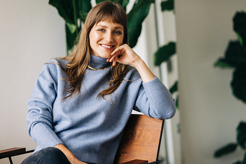 Successful young businesswoman smiling at the camera