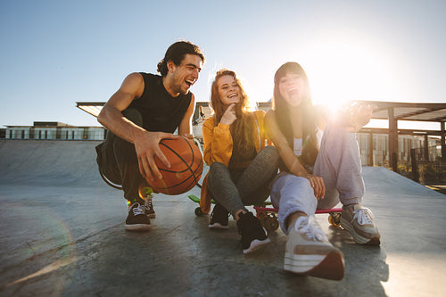 Friends spending time together at skate park