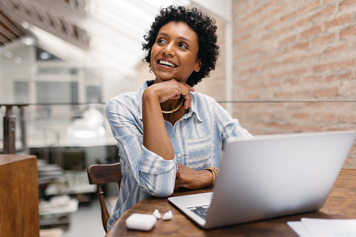 Small business owner thinking of new crative ideas in a warehouse
