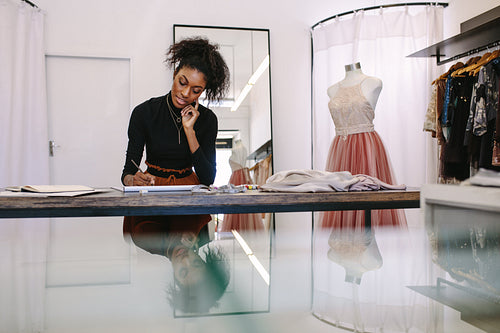 Woman entrepreneur at work in her boutique