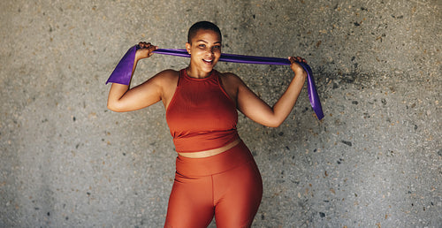 Woman working out with resistance band