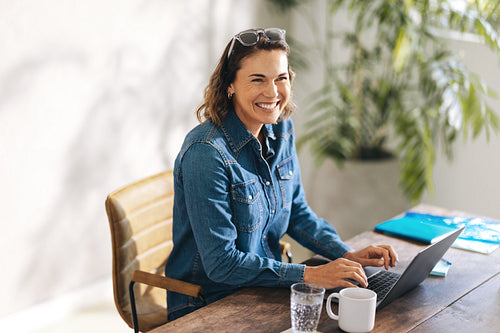 Driven businesswoman achieving success in the workplace