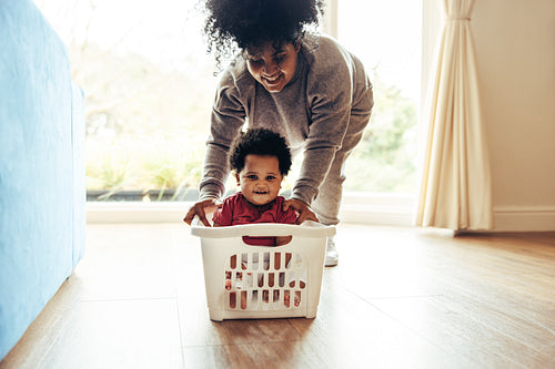 Mother and baby playing at home