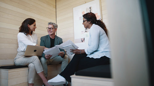 Businesspeople having a brainstorming session at work