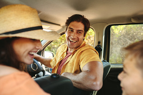 Happy family in a car