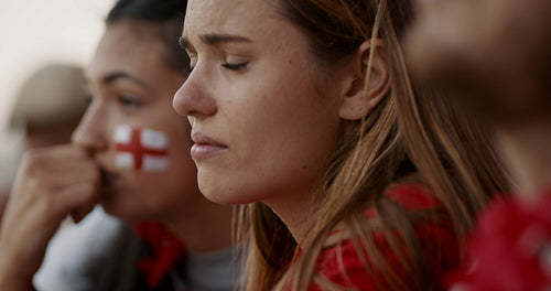 Crying English soccer supporters in stadium