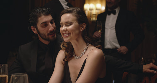 Cheerful couple having a great time at party